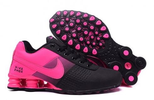 pink and black sneakers