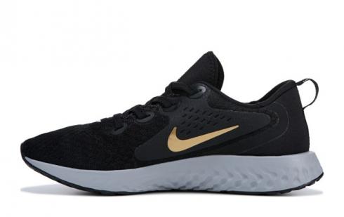 Nike legend react gold