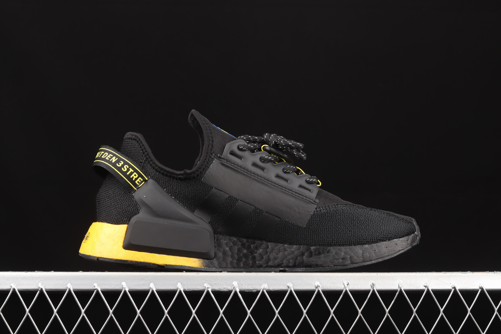 Nmd r1 black and yellow store