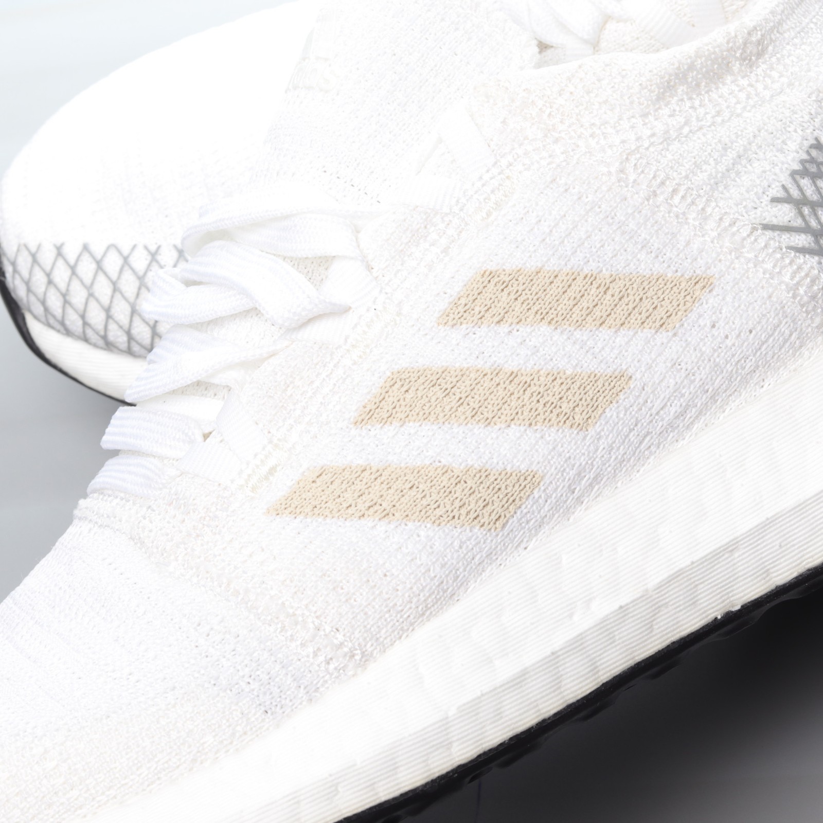 Adidas PureBoost Go Cloud White AH2311 - nmd orange noise on feet and hands  at night time - StclaircomoShops