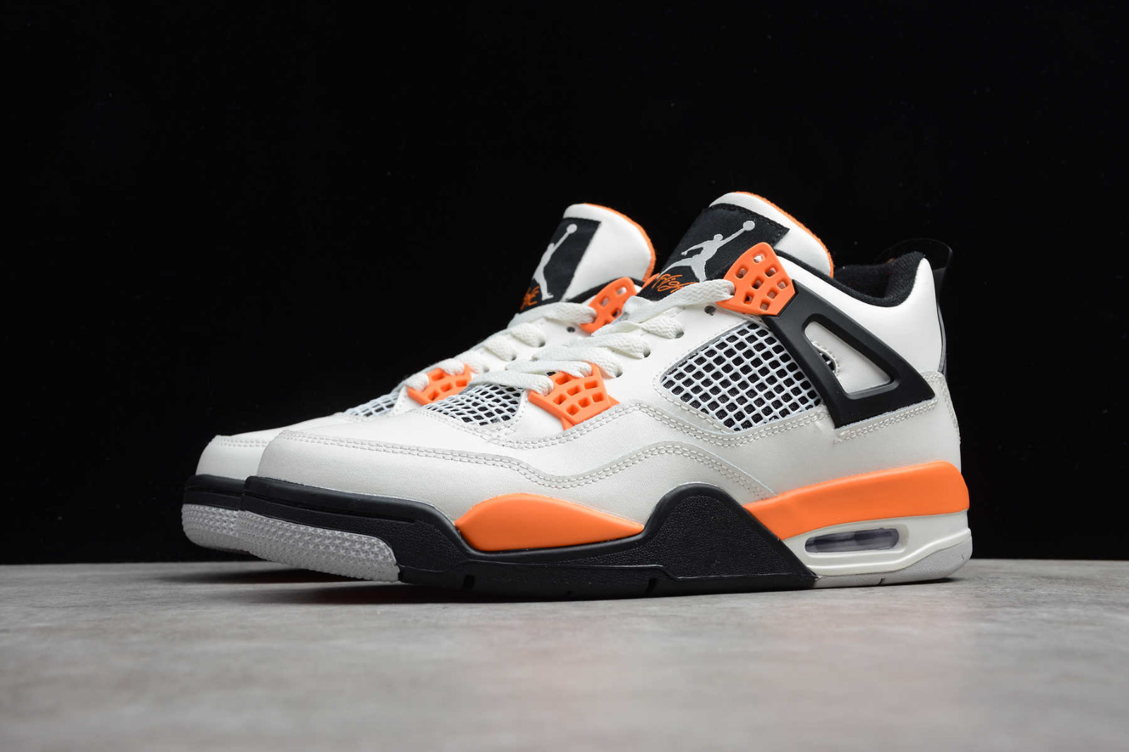 White black store and orange jordans