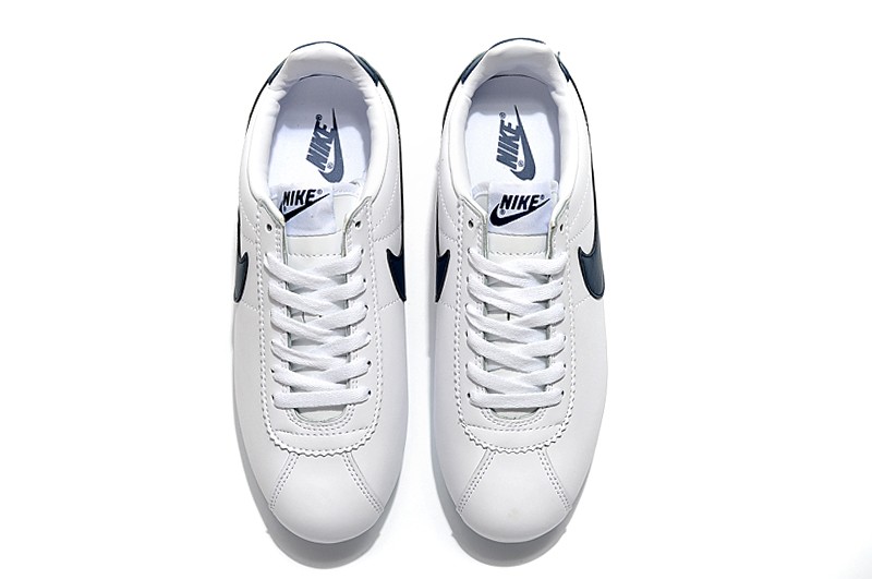 white and navy blue cortez