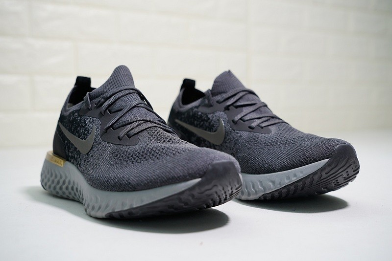Nike running legend react trainers in black discount and gold