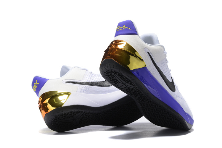 Kobe ad gold shop and white