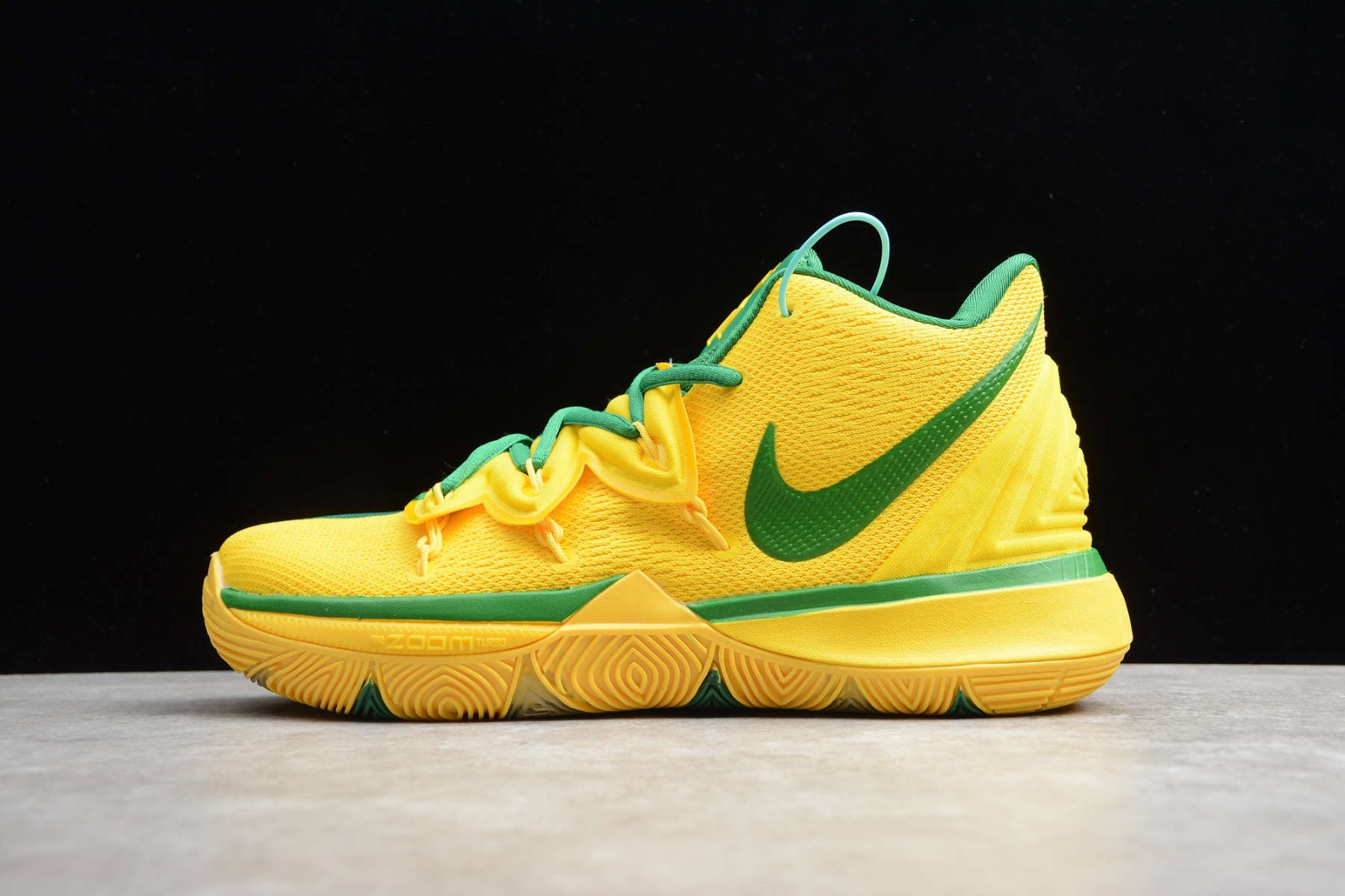 Green and yellow basketball shoes